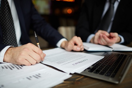 businessman reading contract closeup1